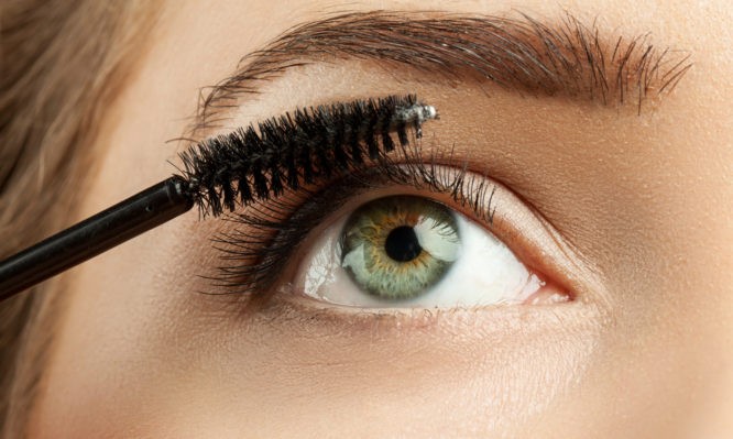 Make-up green eye with long lashes with black mascara