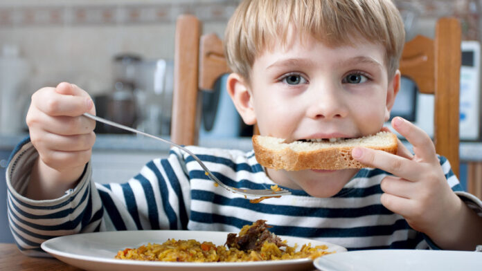 little beautiful boy eating