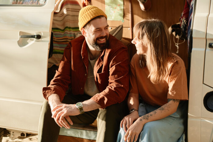 Young couple talking outdoors